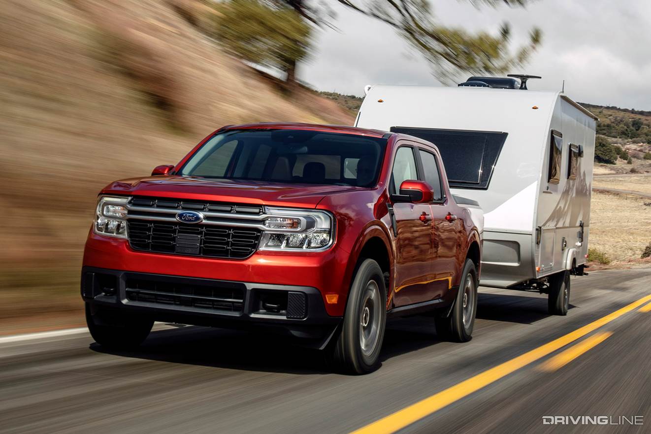 Ford Maverick red towing 5th wheel