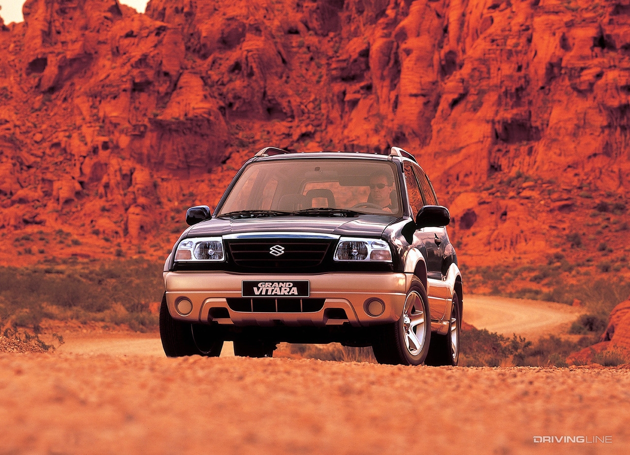 Suzuki Grand Vitara against red rocks