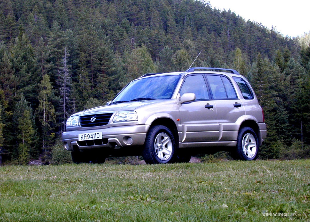 Suzuki Grand Vitara in forest