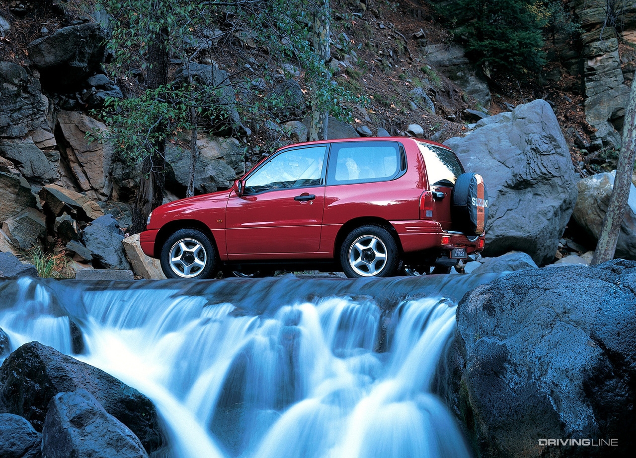 Suzuki Vitara on waterfall