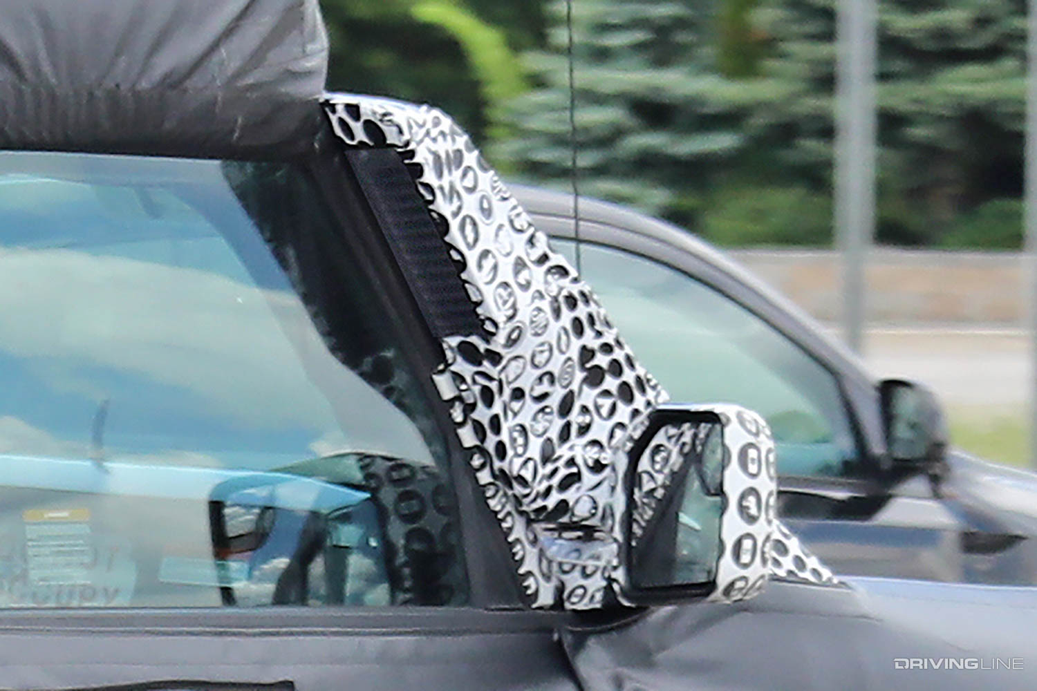 Spy Photos of new Ford Bronco Hybrid prototype engine intake snorkel on passenger A pillar
