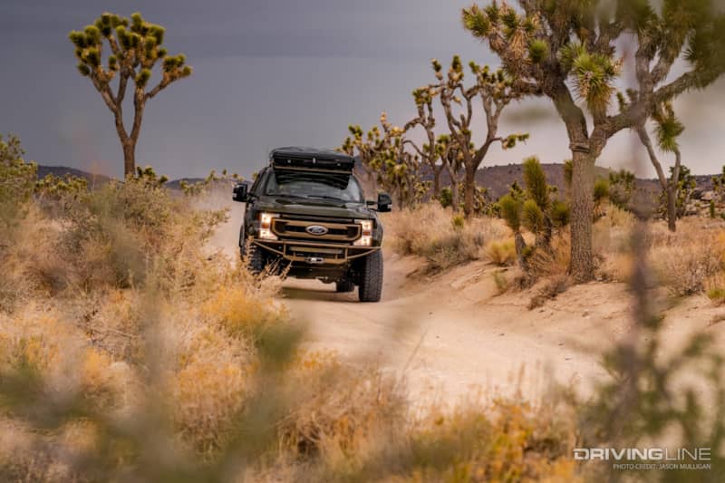 LGE CTS Ford Super Duty driving on dirt road