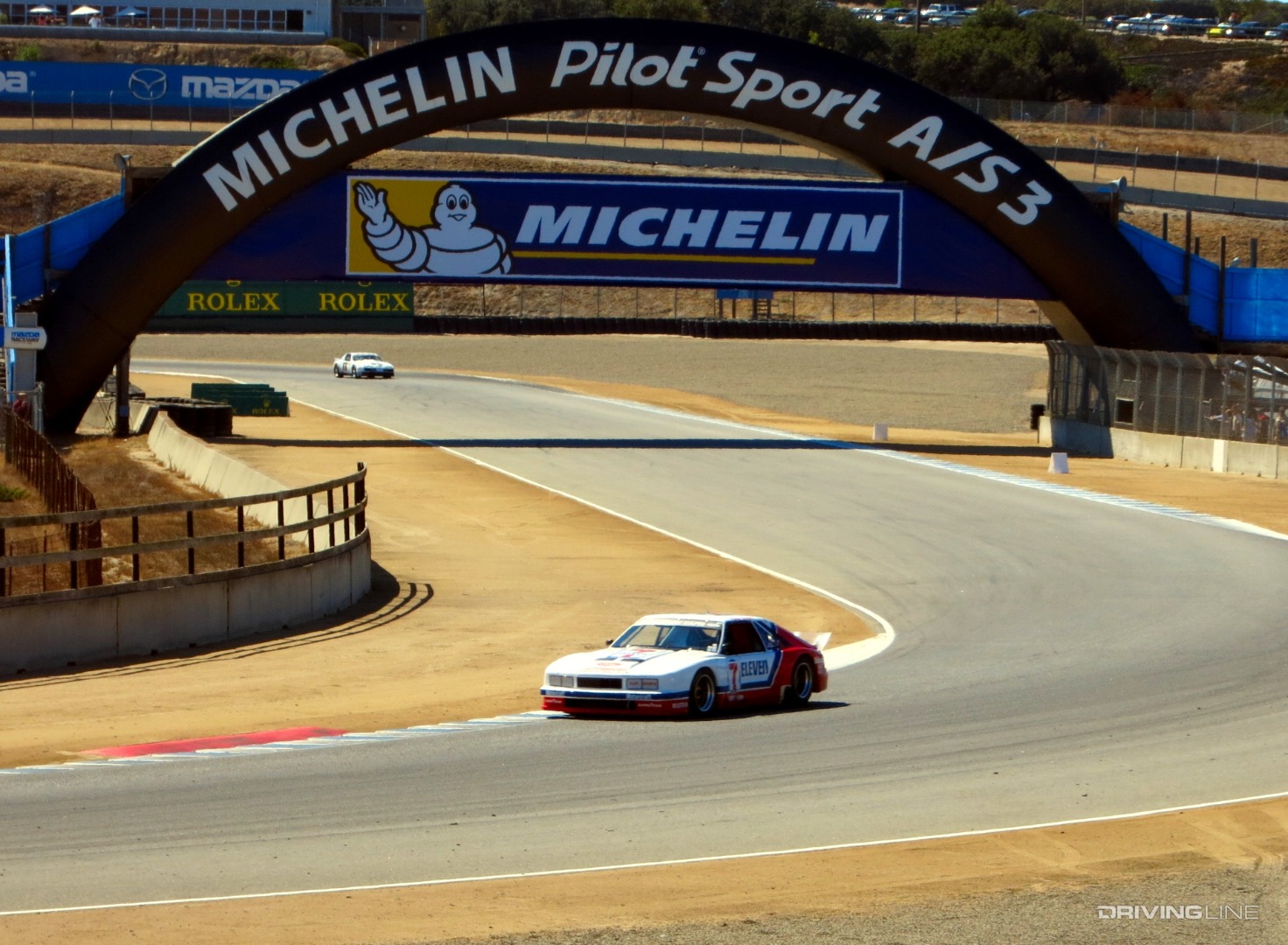 Ford Mustang IMSA GTO on track in corner Monterey Historics