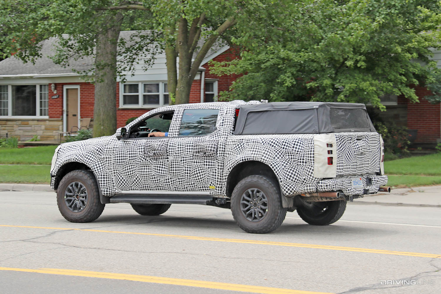 Spy Photos '23 Ford Ranger Raptor driving on public road