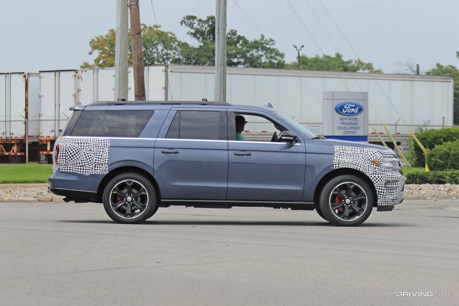 Spy Photos: 2022 Expedition ST side profile in front of Ford facility