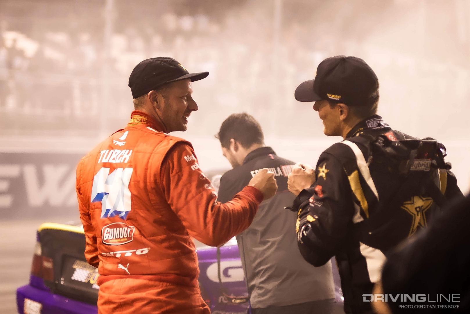 Ryan Tuerck and Fredric Aasbo fist bumping at 2021 Formula Drift St Louis
