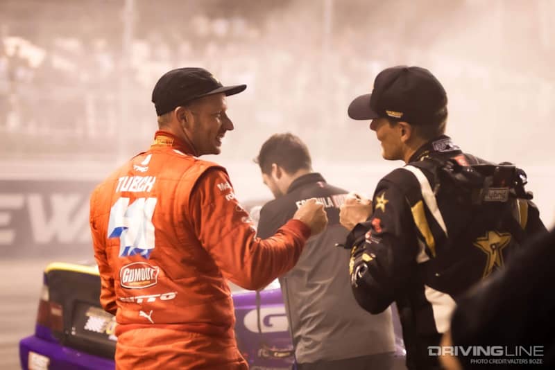 Ryan Tuerck and Fredric Aasbo fist bumping at 2021 Formula Drift St Louis