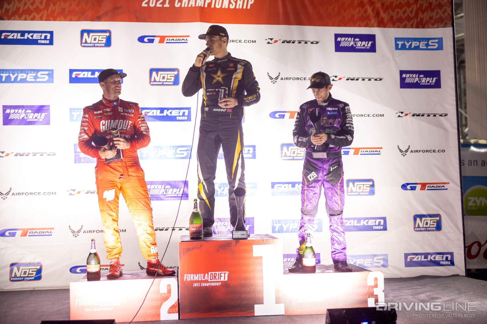 Ryan Tuerck, Fredric Aasbo, and Dylan Hughes on the podium at 2021 Formula Drift St Louis