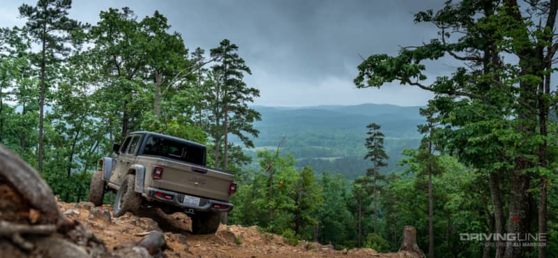 nitto tire recon grappler a/t on Jeep Gladiator in forest