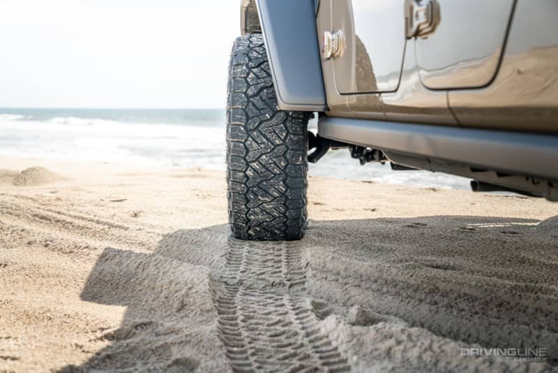 nitto tire recon grappler a/t on a sandy beach