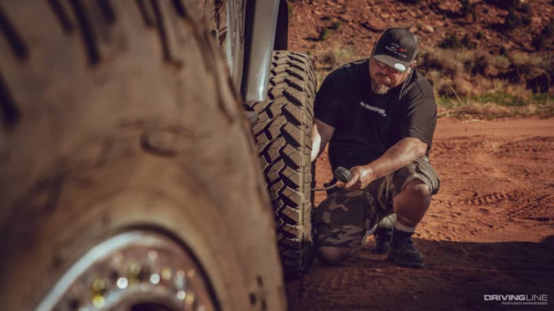 Mel Wade airing down Nitto Trail Grappler tires before hitting a trail