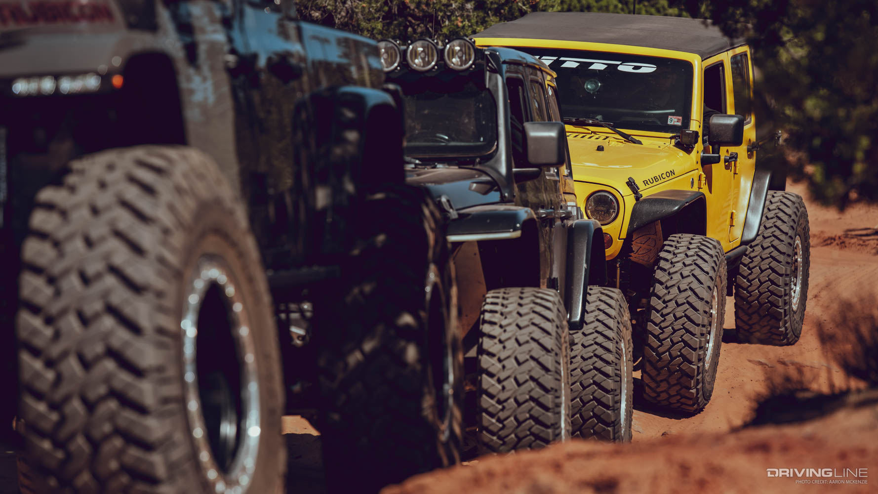 Three modified Jeeps on Nitto Trail Grappler tires