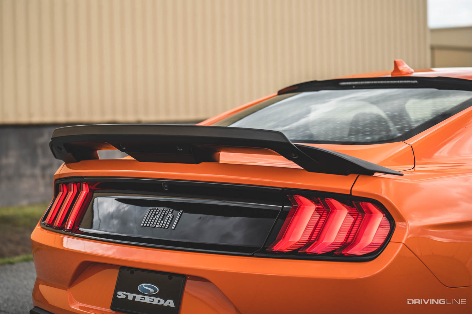 High mount and rear spoiler on Steeda Mustang Mach 1 Orange