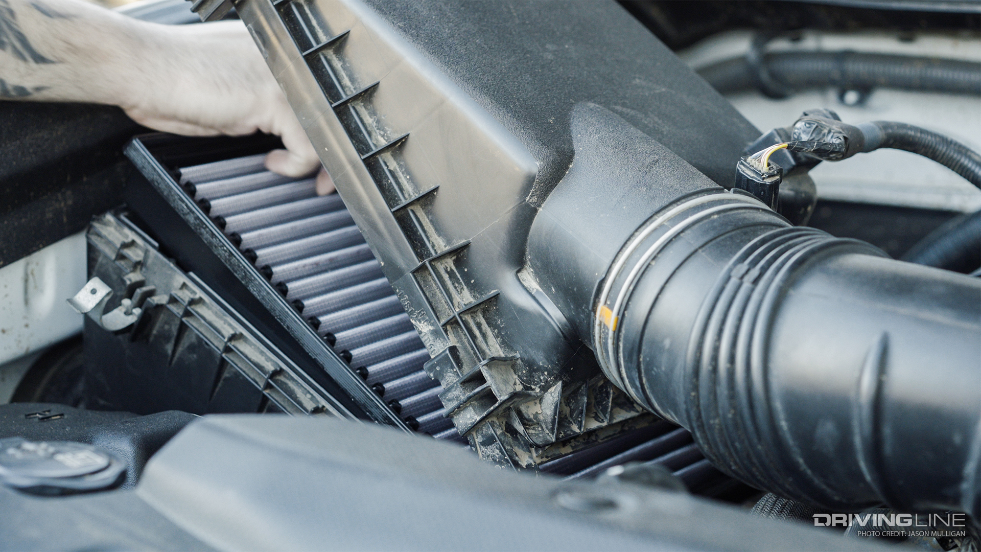Checking the air filter on a Toyota truck