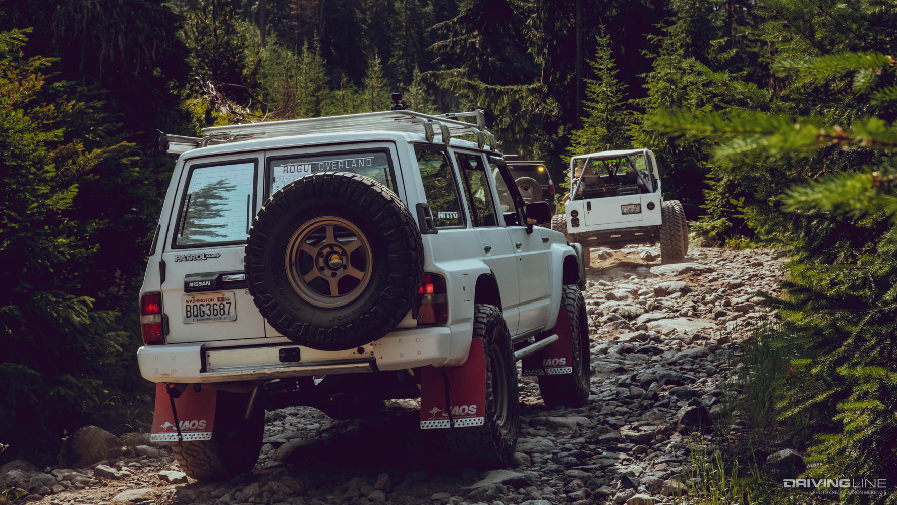 Nissan Patrol off-road SUV on rocky trail