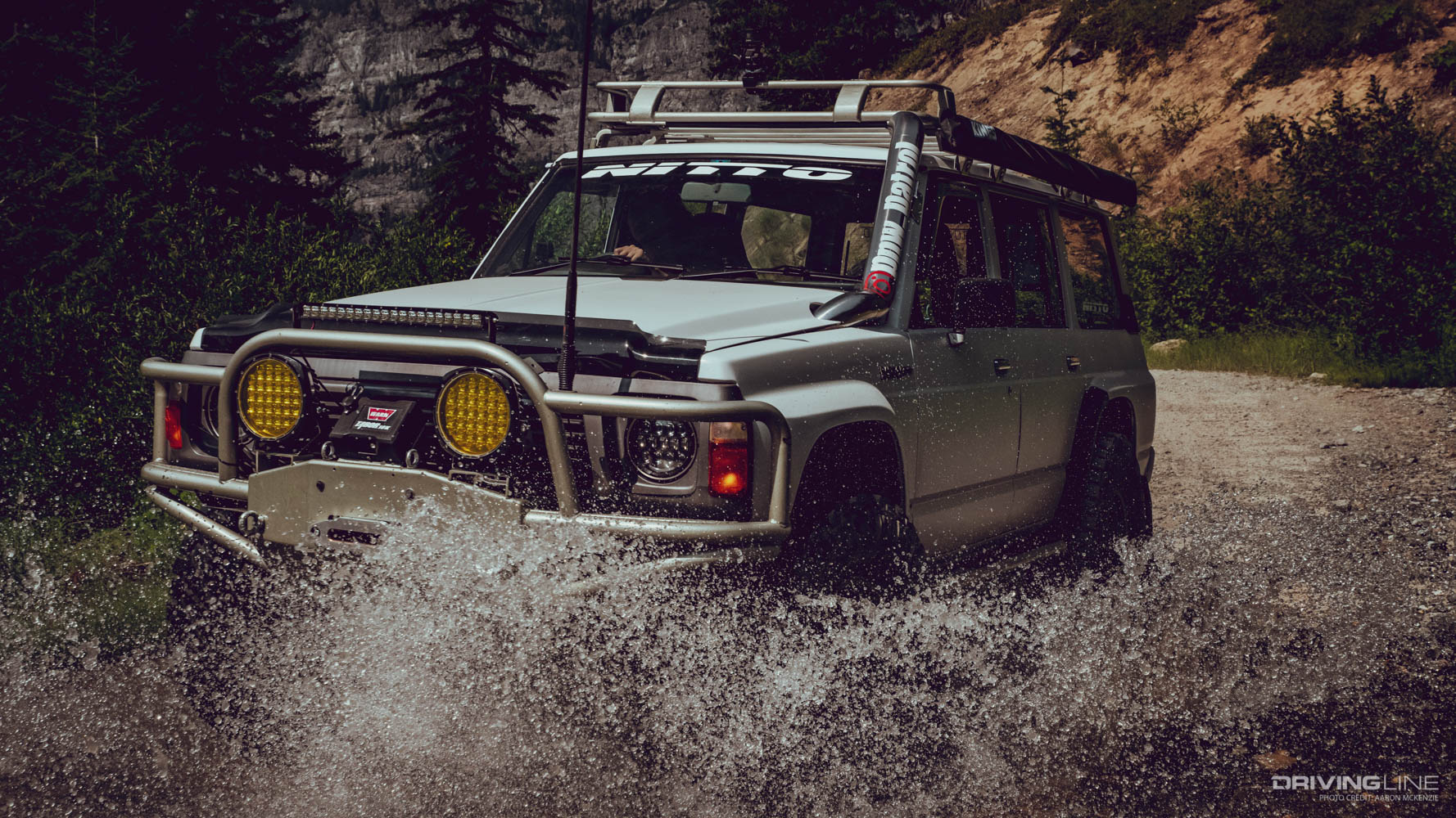 1991 Nissan Patrol on Nitto Ridge Grappler Tires driving through water