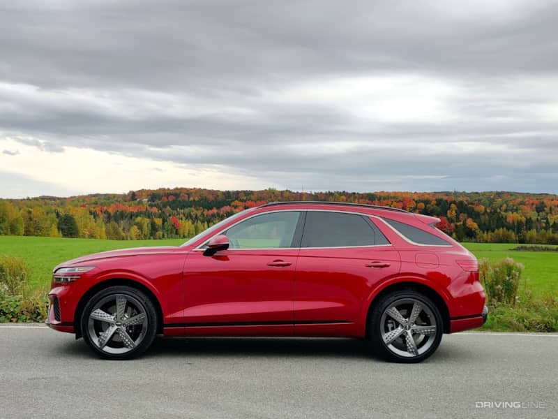 2022 Genesis GV70 side view in front of field