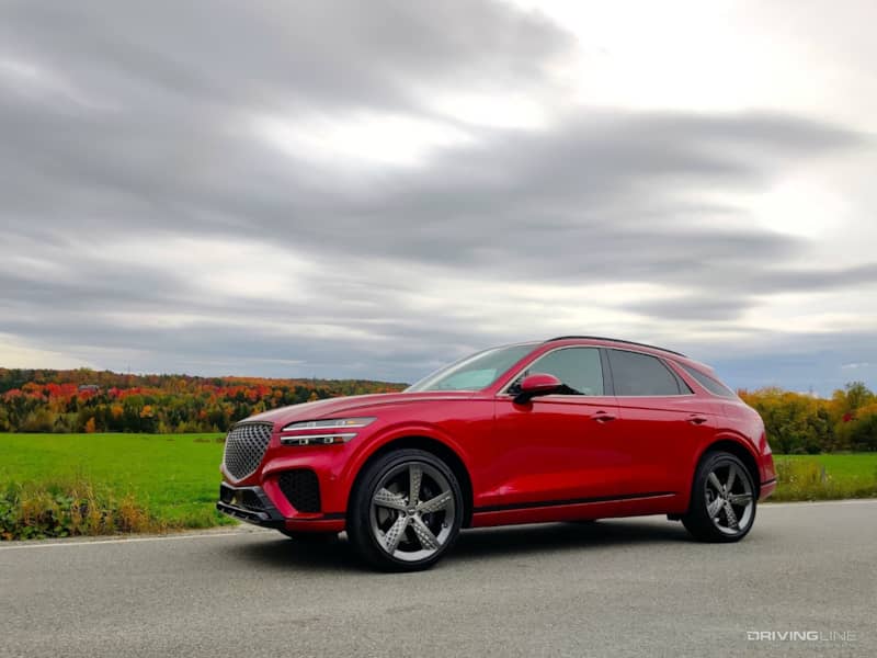 2022 Genesis GV70 red against green field