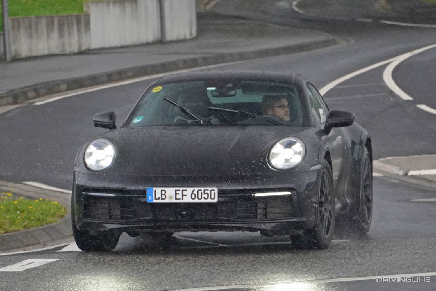 Spy Photos: Upcoming Rally-Inspired, Lifted Porsche 911 Safari testing in rain