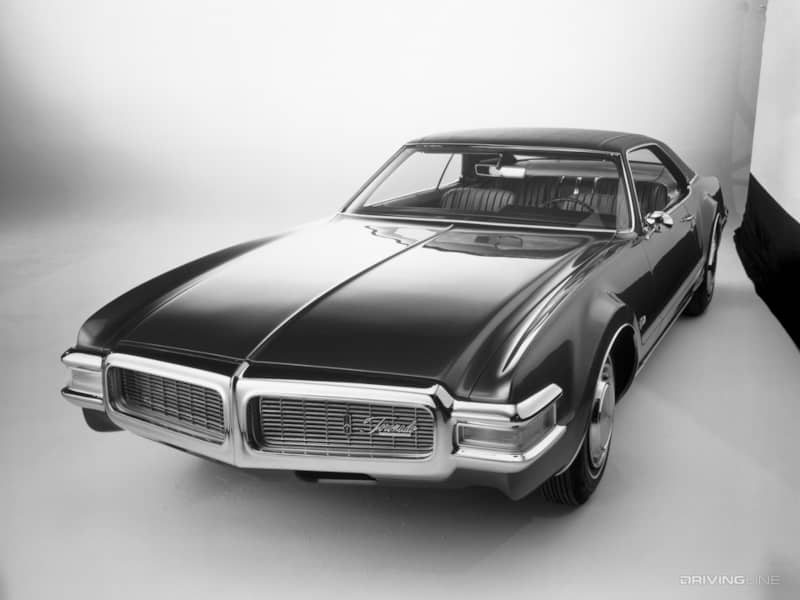 Oldsmobile Toronado in black and white front view