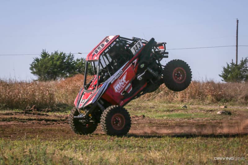 a UTV coming down on its front wheels