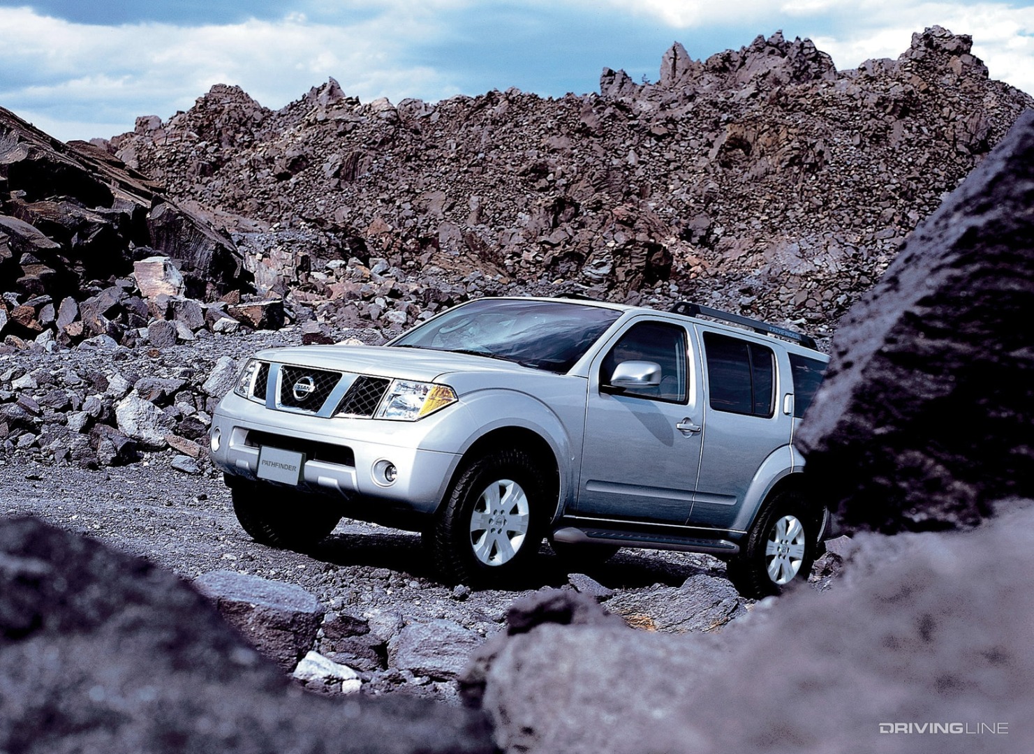 Nissan Pathfinder seen through rocks