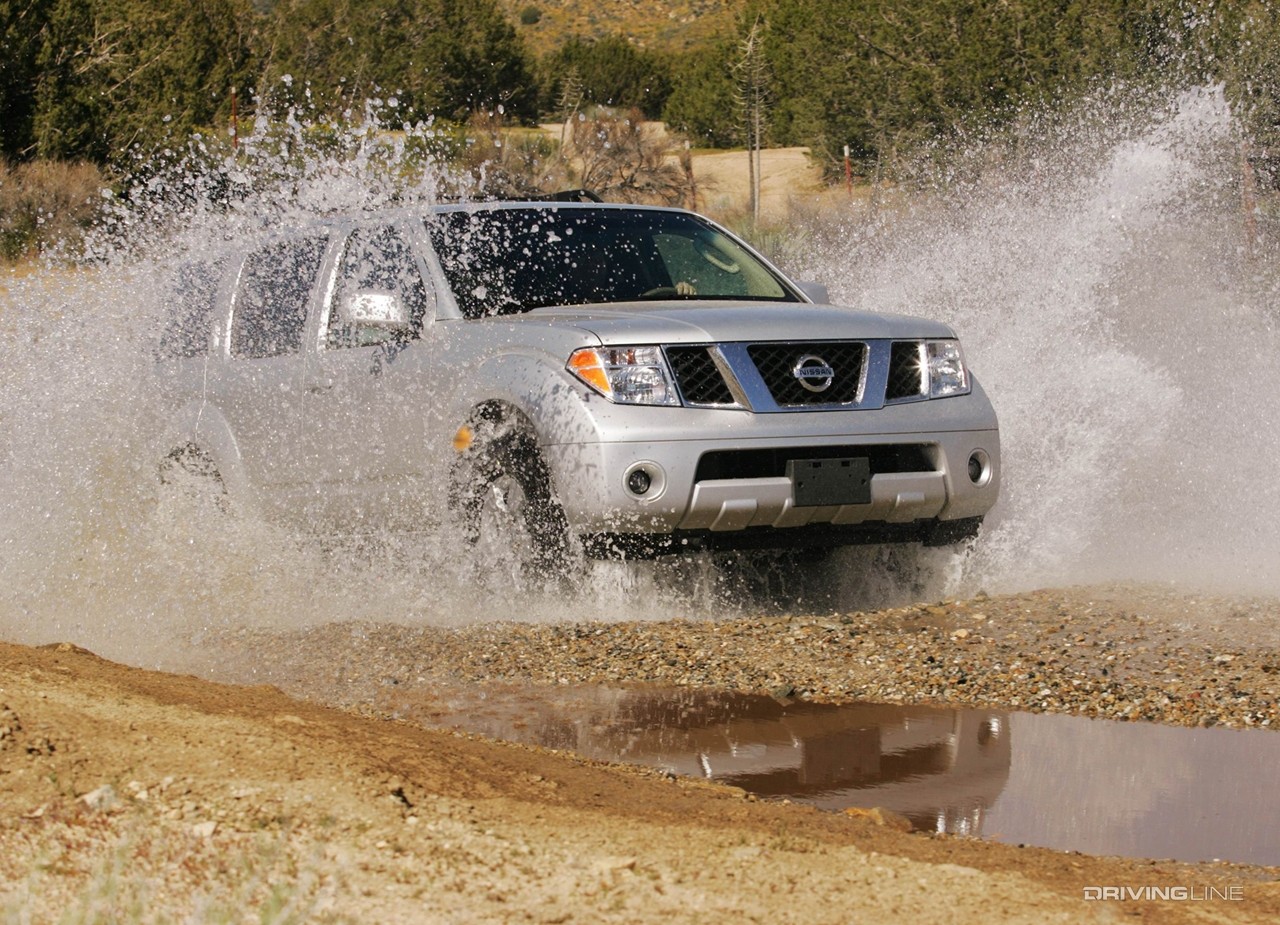 Nissan Pathfinder splashing through water