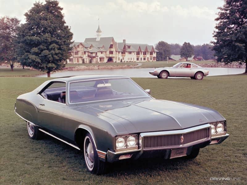 1970 Buick Riviera with Opel GT in the background