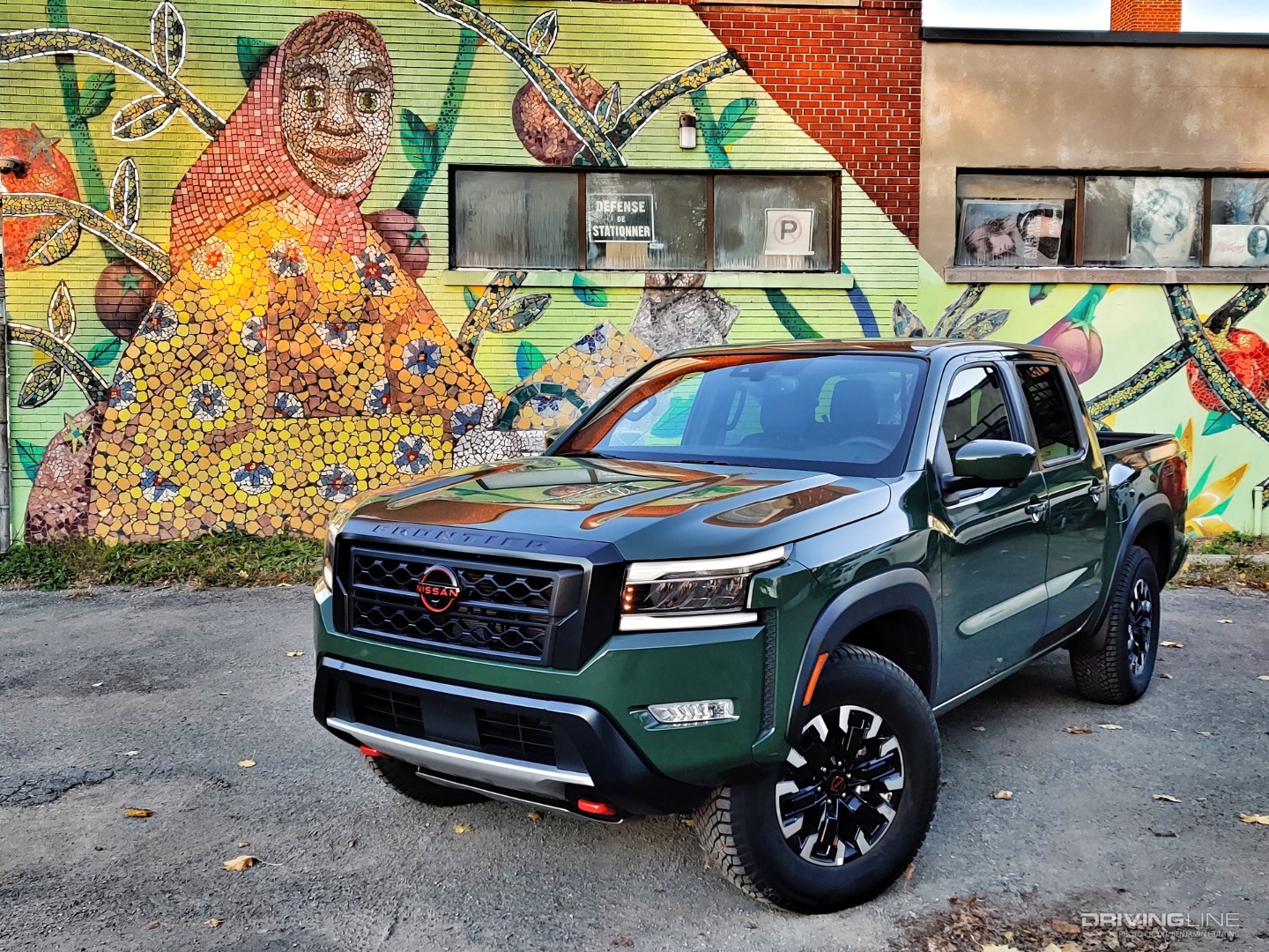 2022 Nissan Frontier front 3/4 in front of mural
