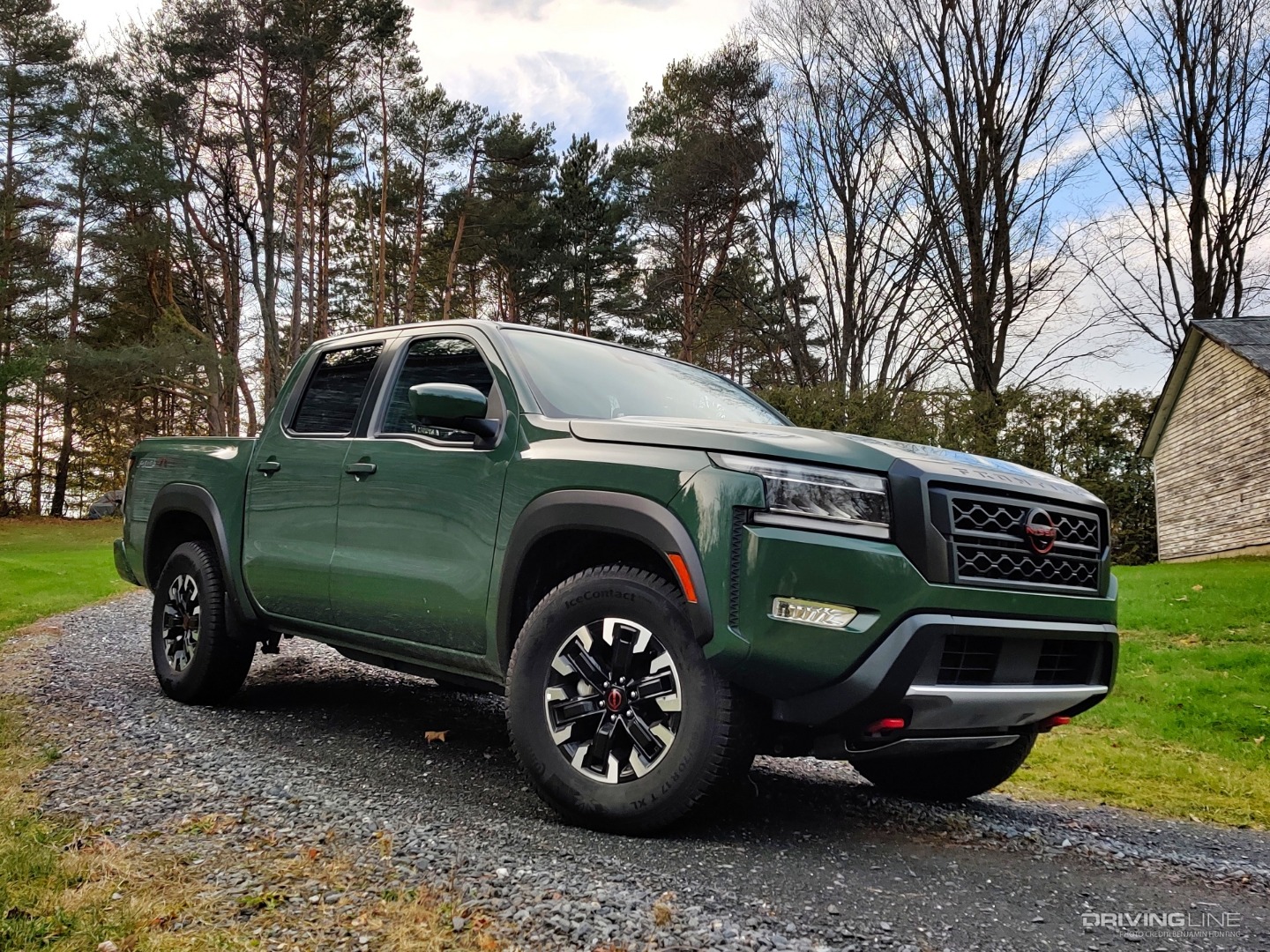2022 Nissan Frontier front 3/4 view on gravel road