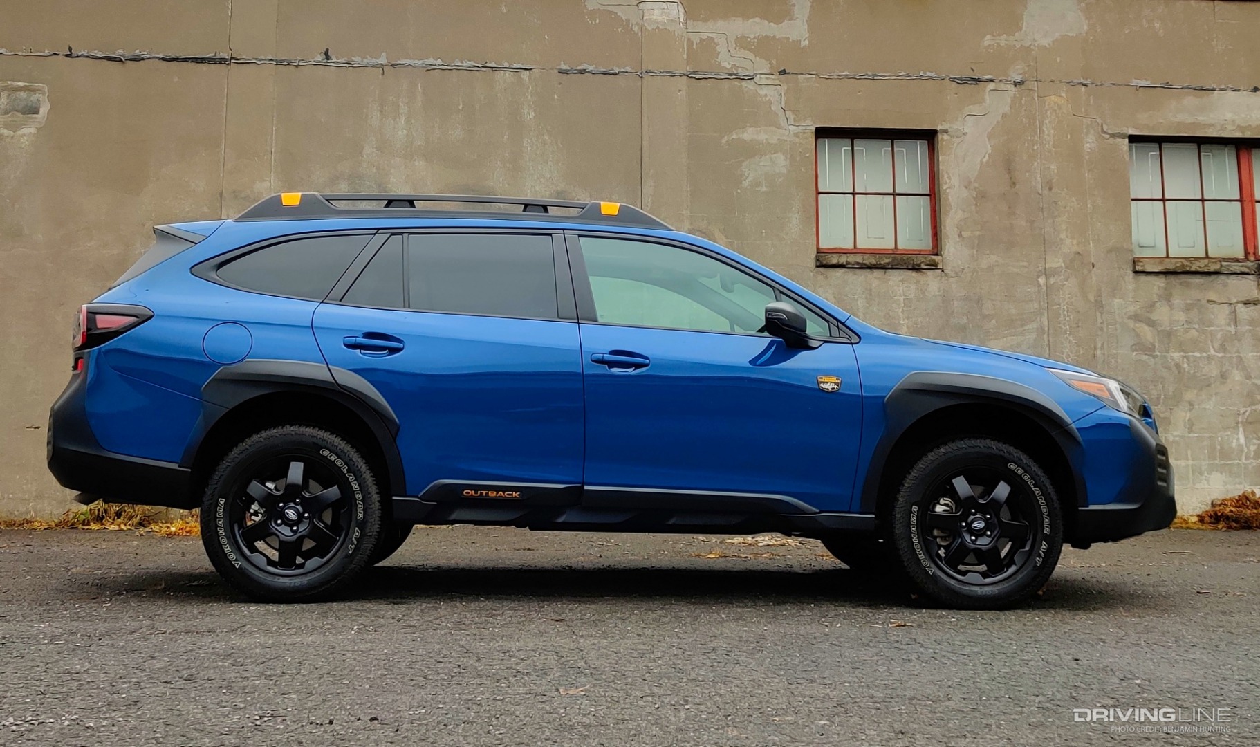 2022 Subaru Outback Wilderness side profile against wall
