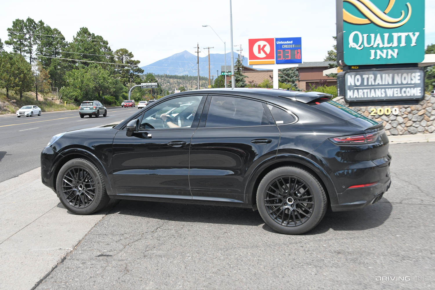 rear driver side of 2023 Porsche Cayenne Turbo SUV