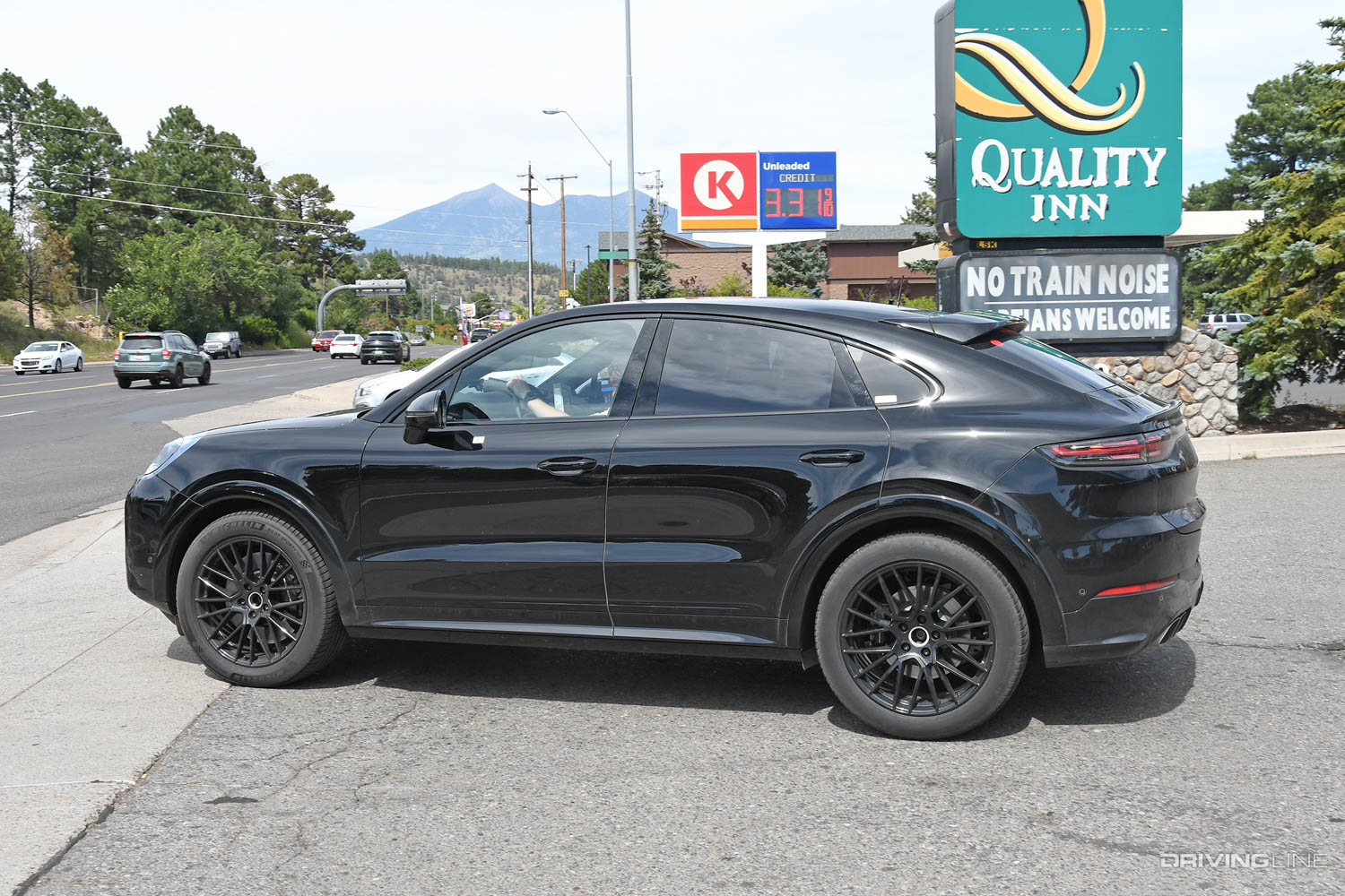 side profile of 2023 Porsche Cayenne Turbo Coupe SUV