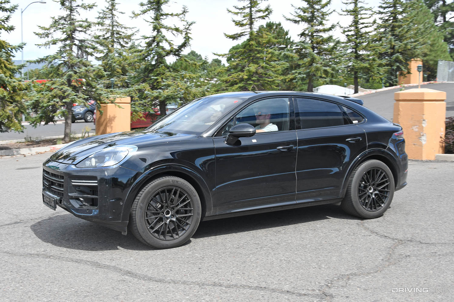 Spy Photos: 2023 Porsche Cayenne Turbo Coupe SUV driver side front view