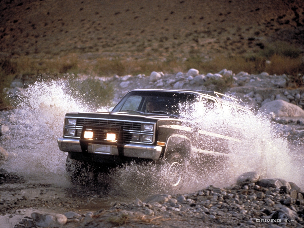 Chevrolet K5 Blazer bursting through a creek