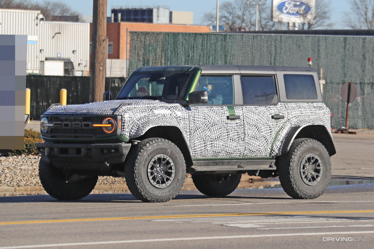 2023 Ford Bronco Raptor front driver side on street Spy Photos