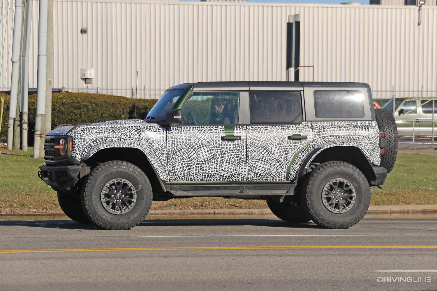 2023 Ford Bronco Raptor driver side profile on street Spy Photos
