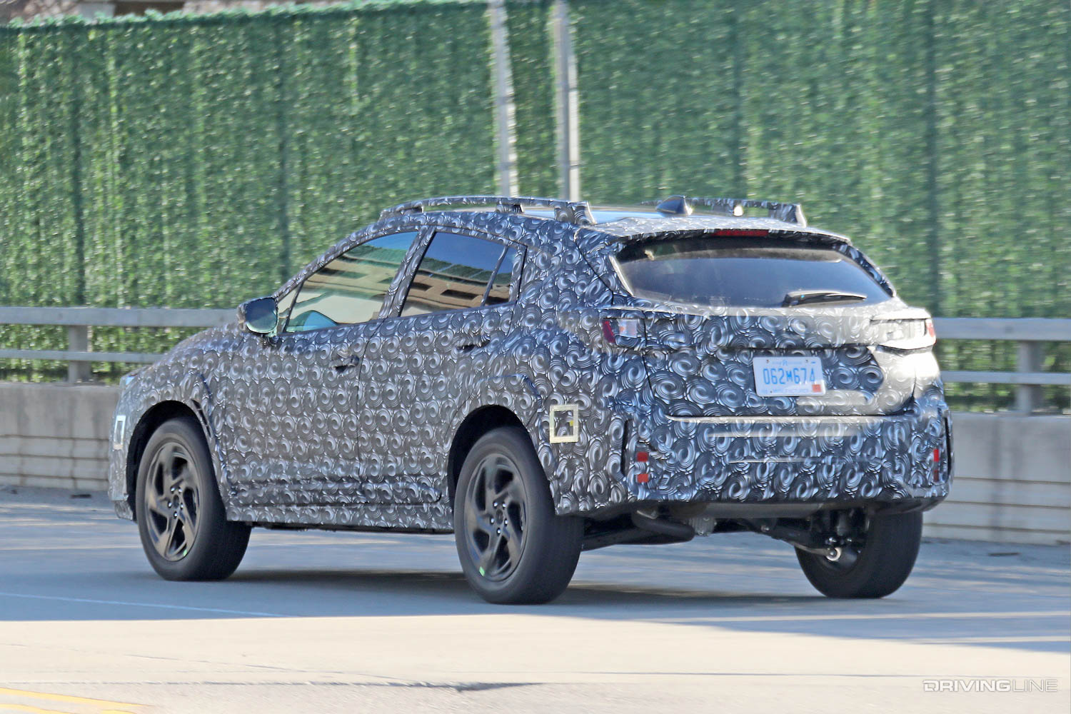rear section and driver side of 2023 Subaru Crosstrek compact SUV
