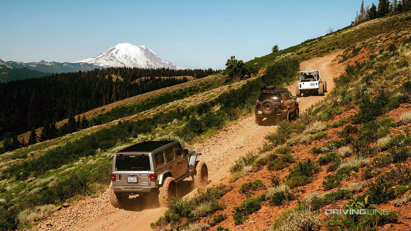 three SUVs off-roading naches trail system