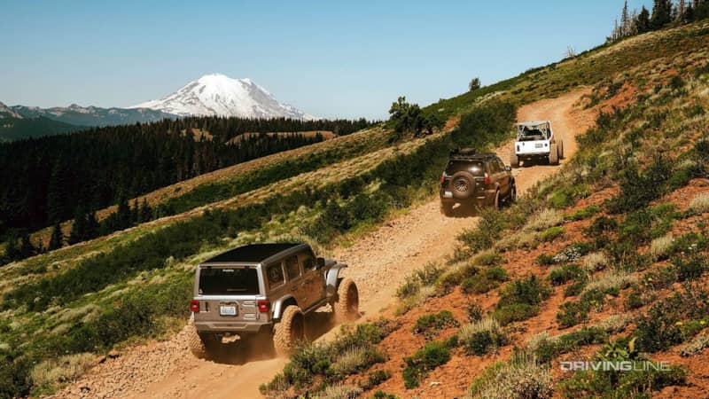 three SUVs off-roading naches trail system