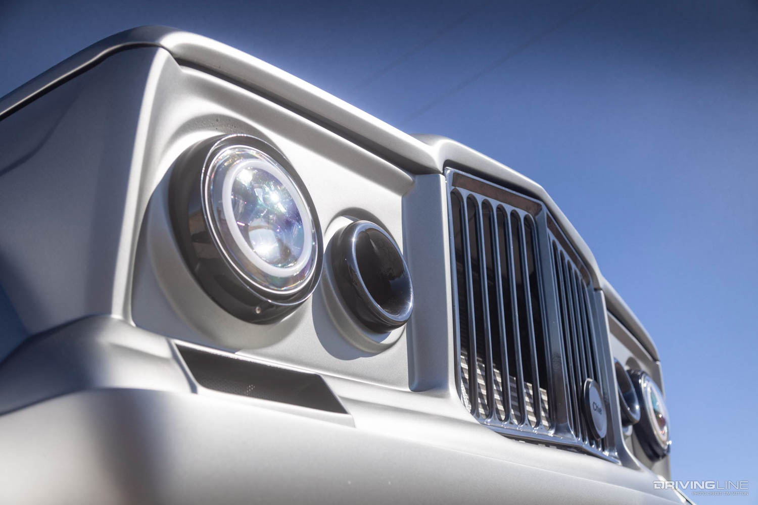 headlight and air intake on front end of custom Jeep Wagoneer