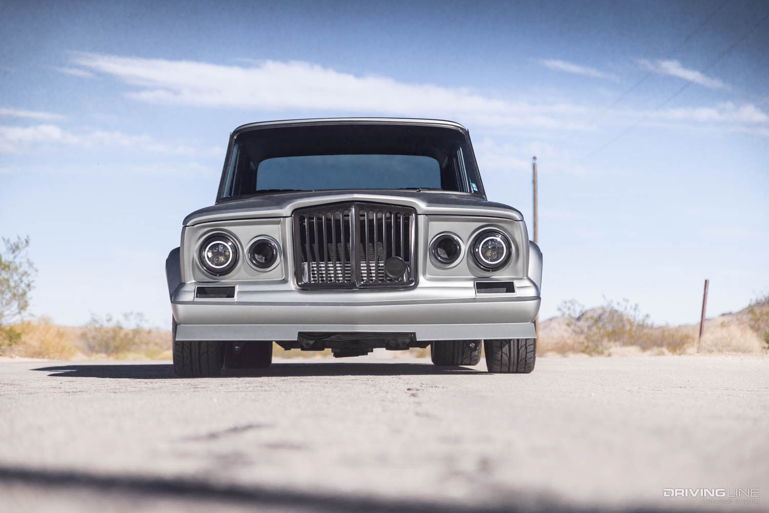 front end of lowered 1975 Jeep Wagoneer on Nitto NT555 G2 tires