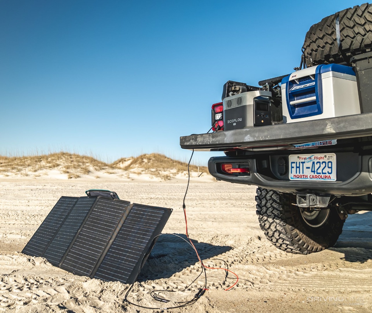 EcoFlow Delta Mini Charging Station on the tailgate of a jeep Gladiator with Nitto Trail Grappler tires
