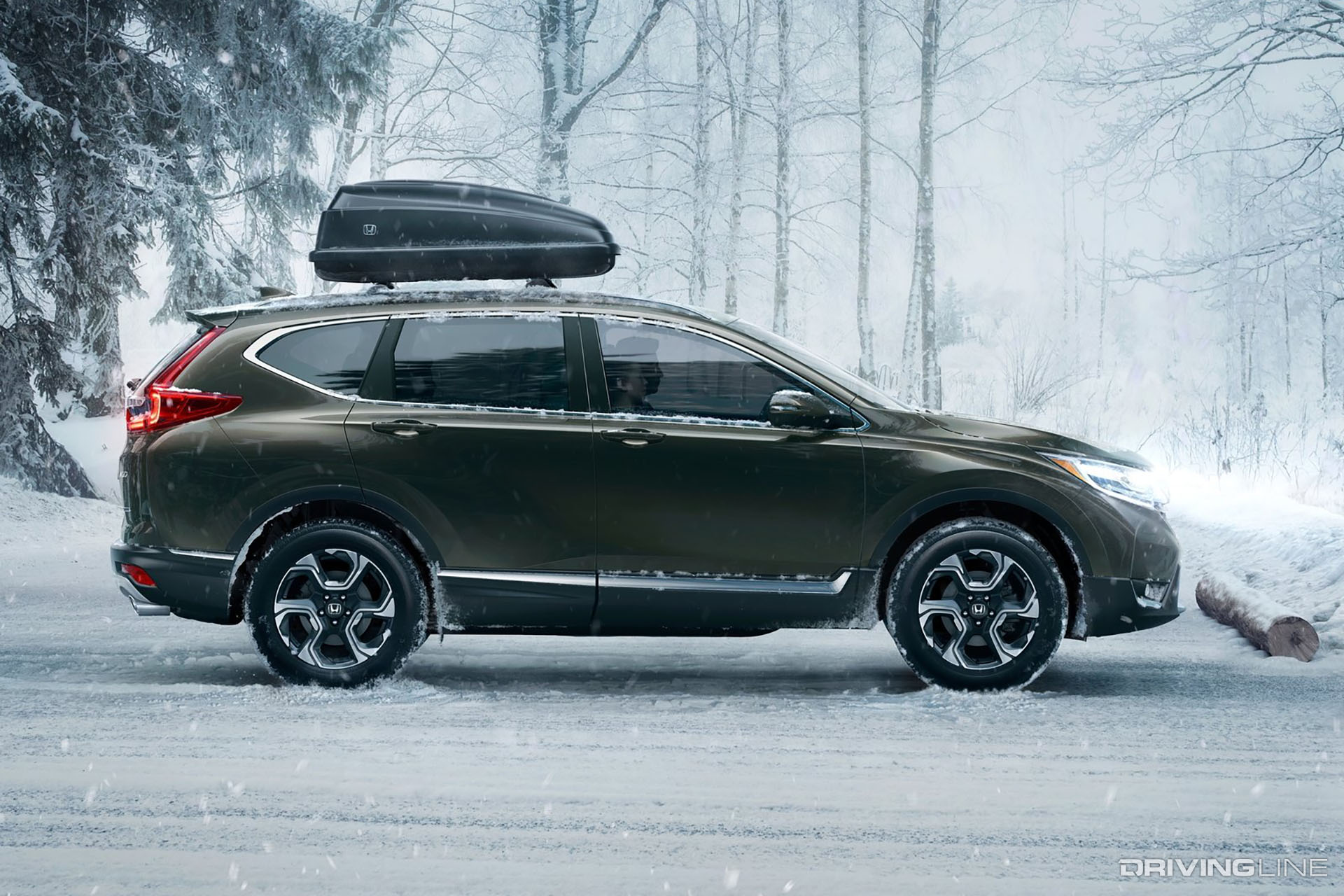 Side of 2017 Honda CR-V with a storage box on top