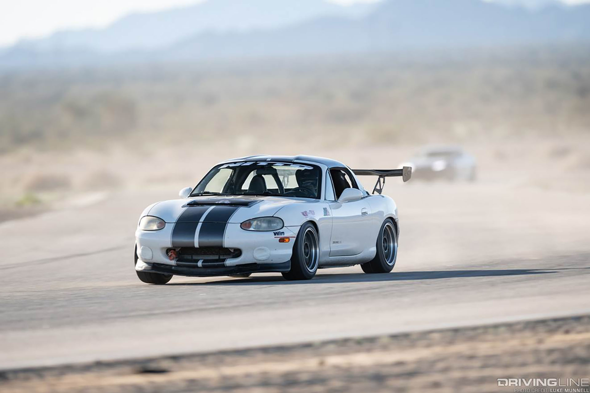 Mazda Miata NB on Nitto NT01 driving on a track