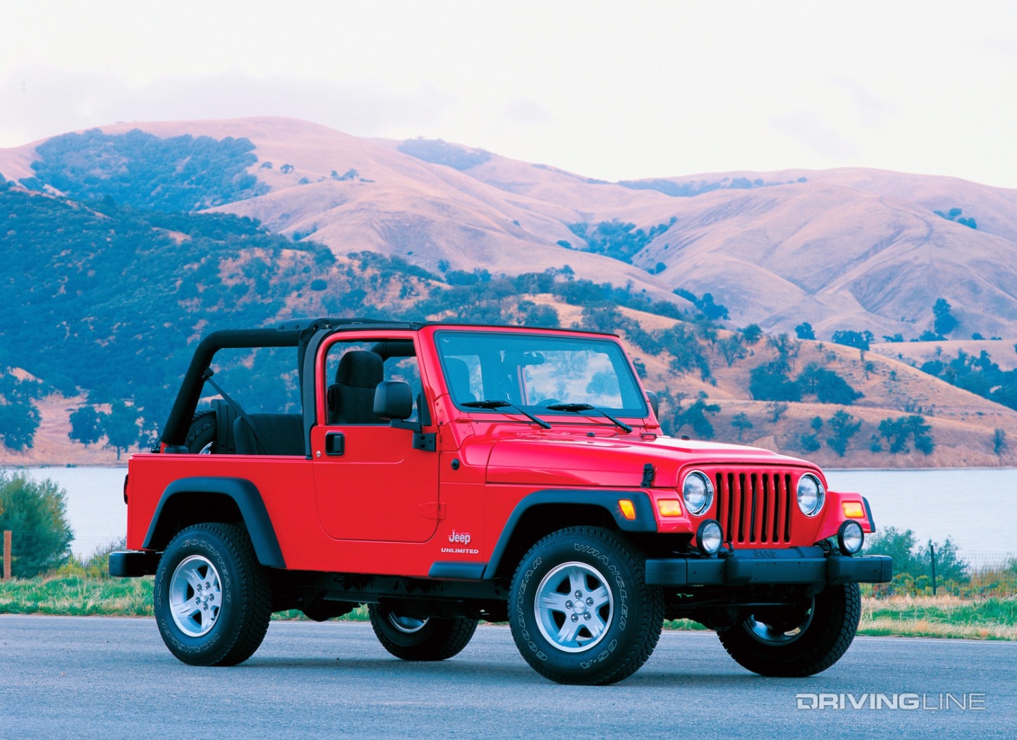 Jeep Unlimited LJ in red with roof open