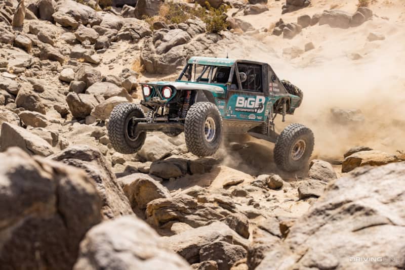 Josh Blyler driving fast over rocks