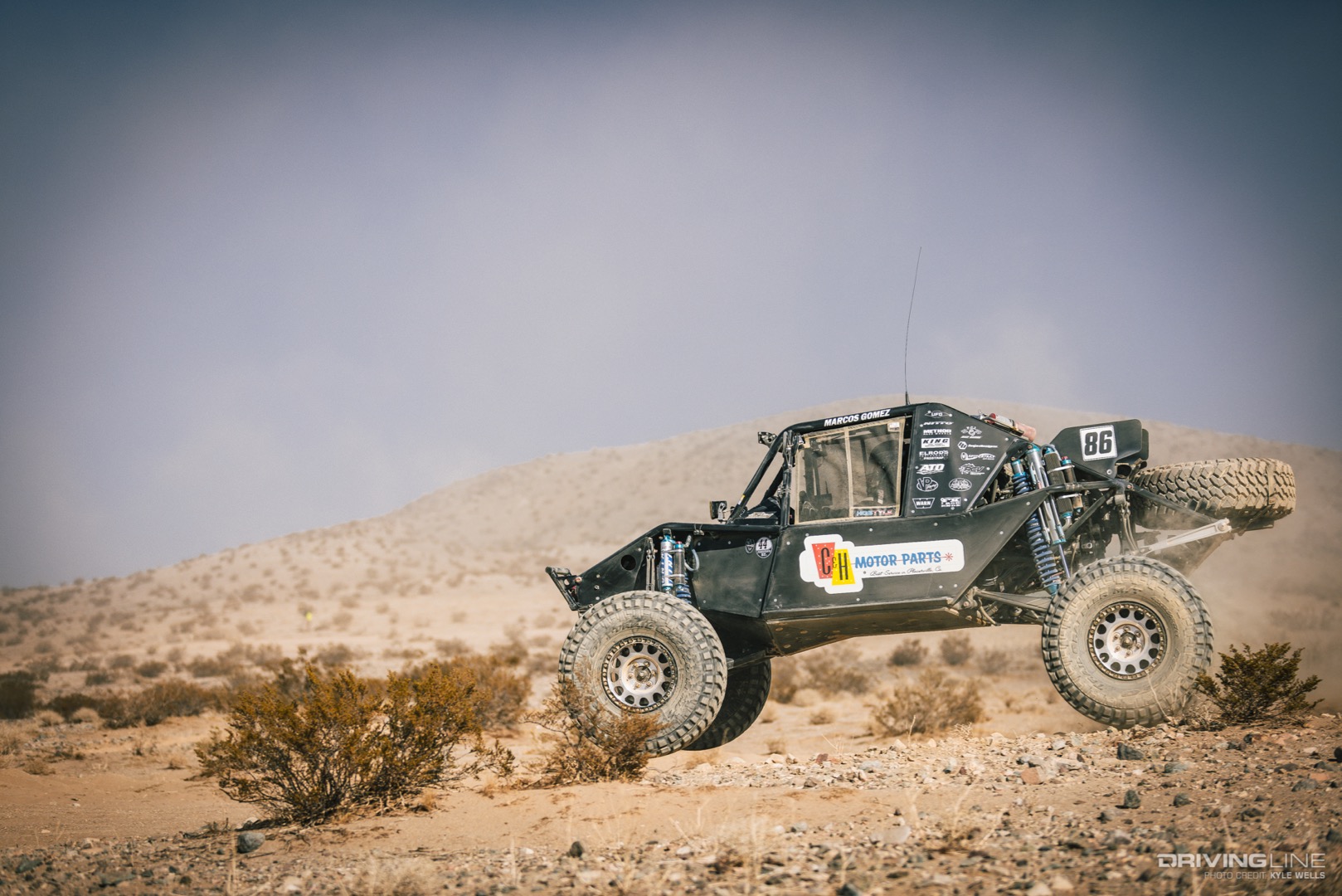 Marcos Gomez driving through the desert