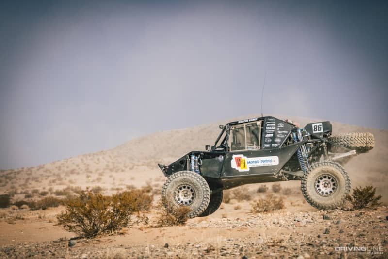 Marcos Gomez driving through the desert