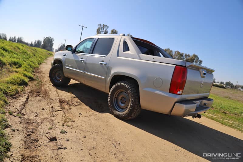 2007 Escalade EXT on Nitto Ridge Grappler and KMC Roswell
